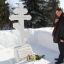 Николай Васильевич возложил цветы на могилу первого настоятеля Собора Илии Карлинова.
