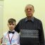 четвероклассник школы № 9 Никита Блинов и тренер-общественник Вячеслав Егоров. 