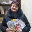 Старший воспитатель детсада № 25 Наталия Баданова передала книги, собранные детьми, родителями и педагогами. 
