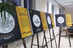 ВыставкаФотовыставка памятных монет "Истории Победы" открылась в Национальной библиотеке Чувашии монеты 